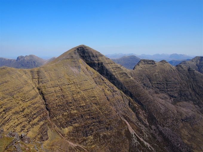 The summit of Beinn Alligin taken from the top that is now a Munro but not in 1990. You can see the horns that John mentions beyond to the right. Photo Colin Matheson