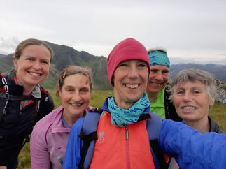 Corri Black, Hazel Dean, Katy Boocock, Sarah Dunn, Sue Savege at changeover on the Mamores ridge